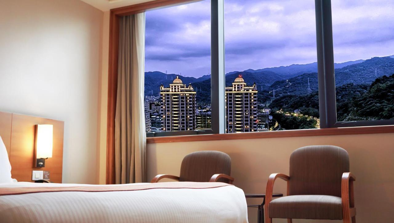 Hione Holiday Hotel Тайбей Номер фото